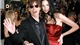Mick Jagger v&#224; LWren Scott trong bữa tiệc của tạp ch&#237; Vanity Fair năm 2006